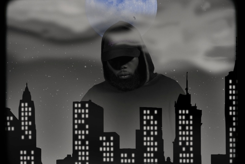  Nighttime and a full-blue moon hangs in the sky behind a black man who towers over skyscrapers. Dark, brooding and graphic-novel like. 