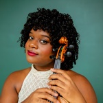 Black/Afro Latina  Pronouns: she/her Curly brown hair Brown eyes