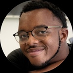 Black / Cis Het Masc Person he/him/his Short black locs Brown eyes