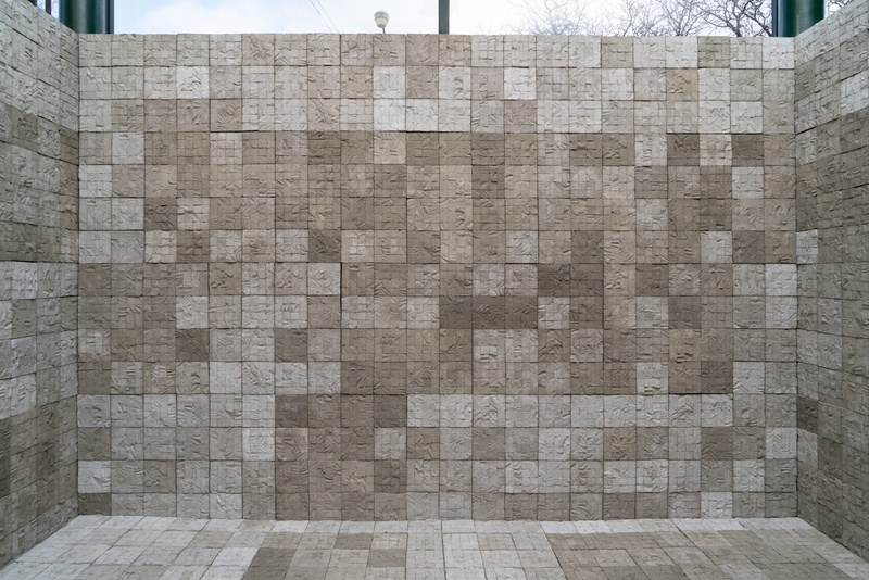  Room installation consisting of hundreds of six-by-six inch unsealed concrete tiles cast from nearly a dozen different human cadavers. 