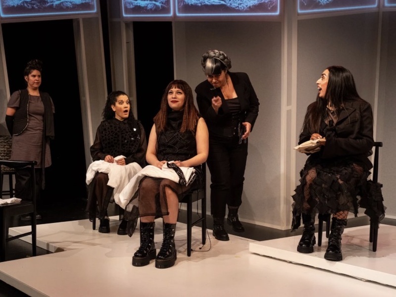  The sisters from Bernada each dressed in black, while their governess Poncia fusses at them. 