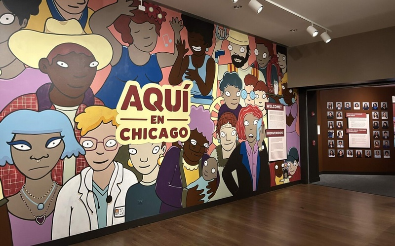  a mural of diverse latin american characters in a crowd. The title "Aqui en Chicago" in the center of the image. 