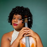 Black/Afro Latina  Pronouns: she/her Curly brown hair Brown eyes