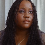 Headshot of Akenya.