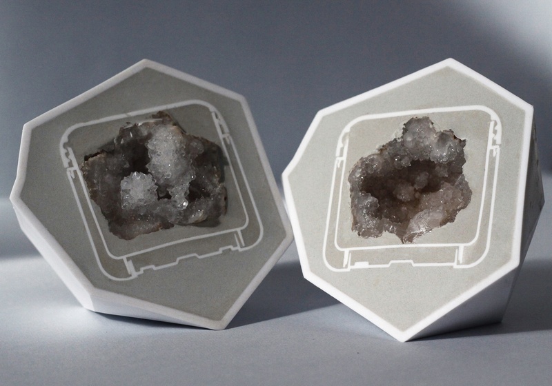  Geode, facial lotion container, and plastic gem nested in resin 
