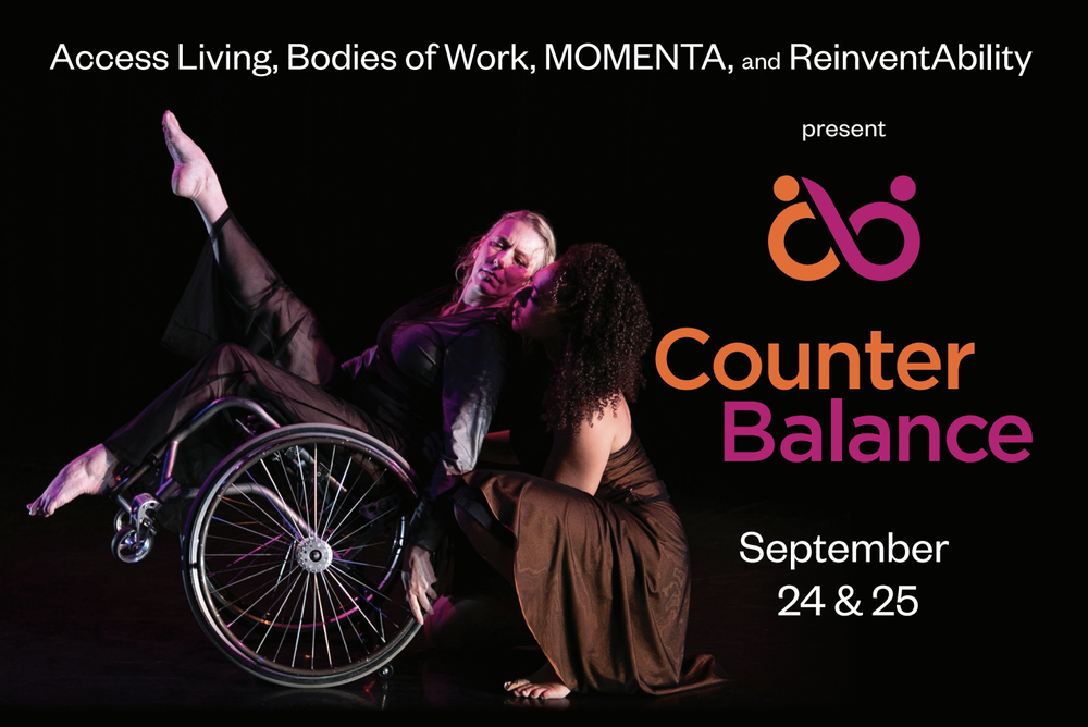 Two dancers in profile on black background with pink stage lighting. One dancer, Ladonna, wears sheer black pants and a dark top. She tilts back in her wheelchair, right leg in the air with her toes pointed. She looks over her shoulder to another dancer,