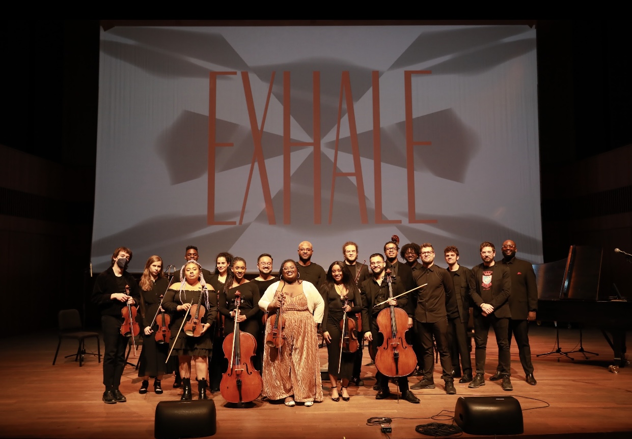  Group of smiling musicians with string instruments 