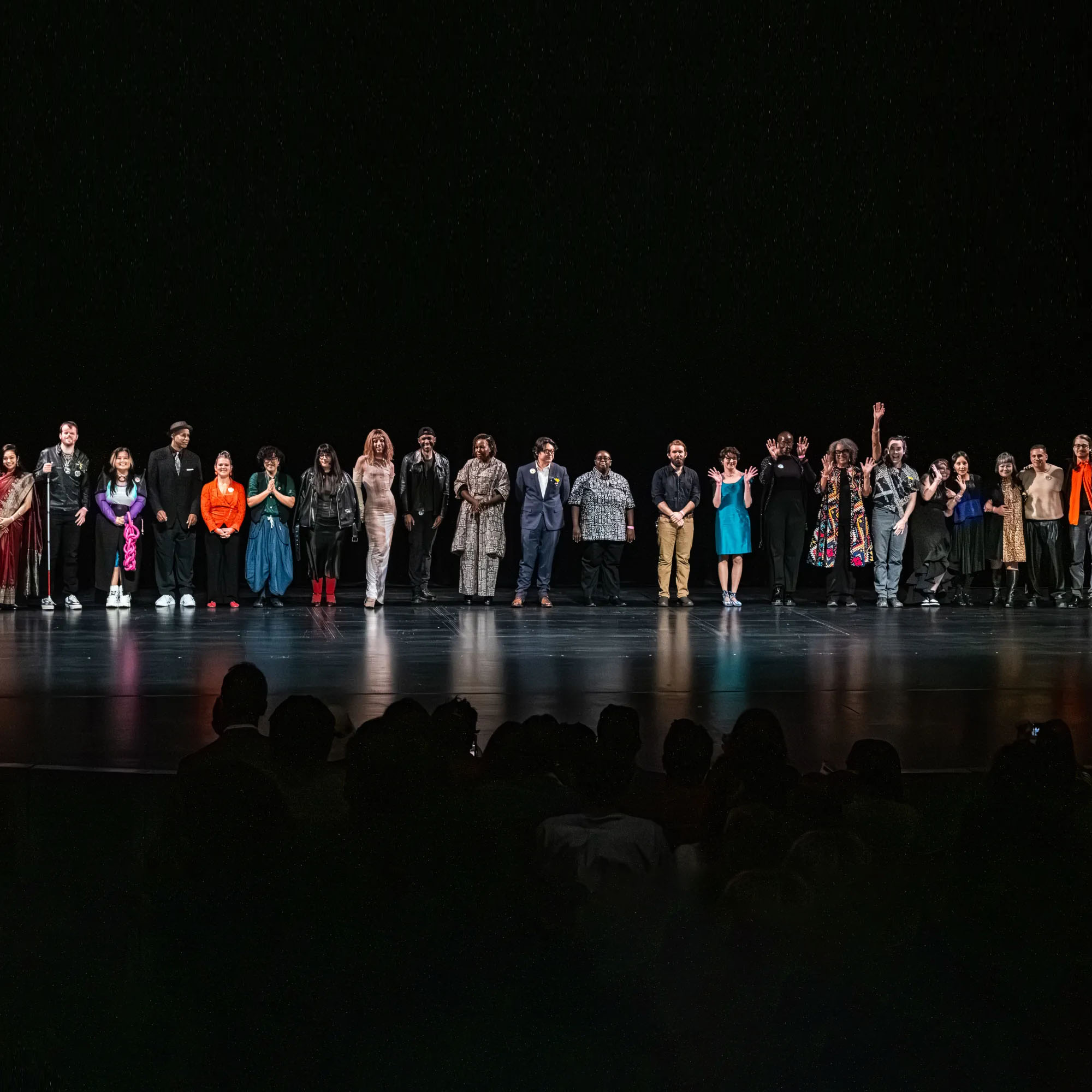 2025 Awardees posing on stage